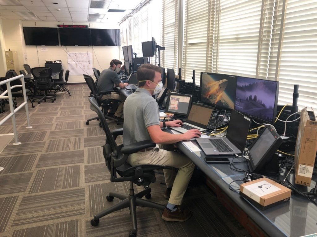 Cameron Muelling, CCP Launch Vehicle Engines Subsystem Manager and Patrick Mills, CCP LV Engines prepare for the launch simulation.